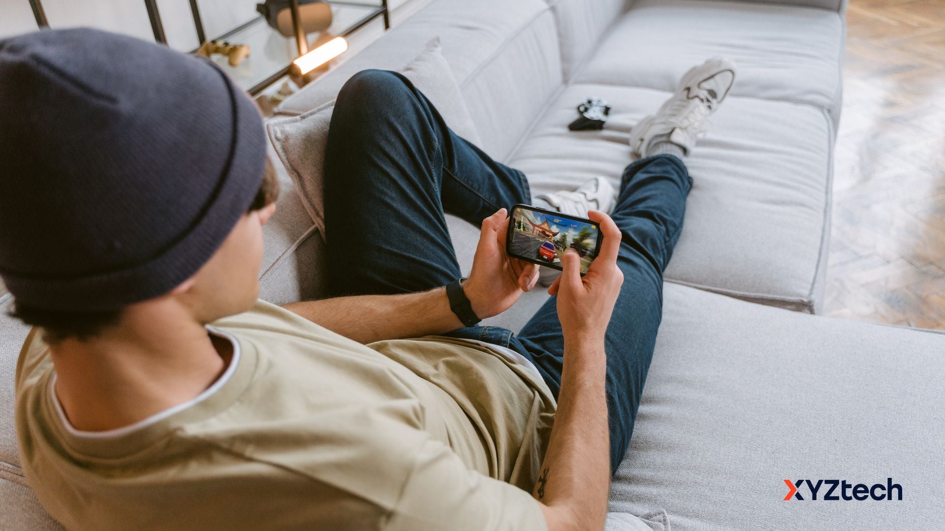 A gamer playing a mobile game.