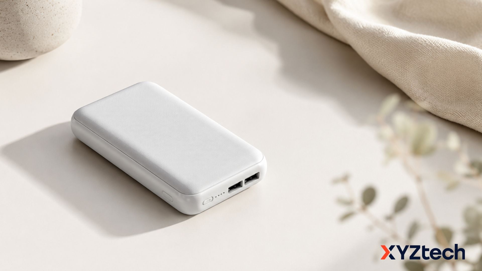 How Long Does a Power Bank Hold a Charge? A White Power Bank on Top of Desk